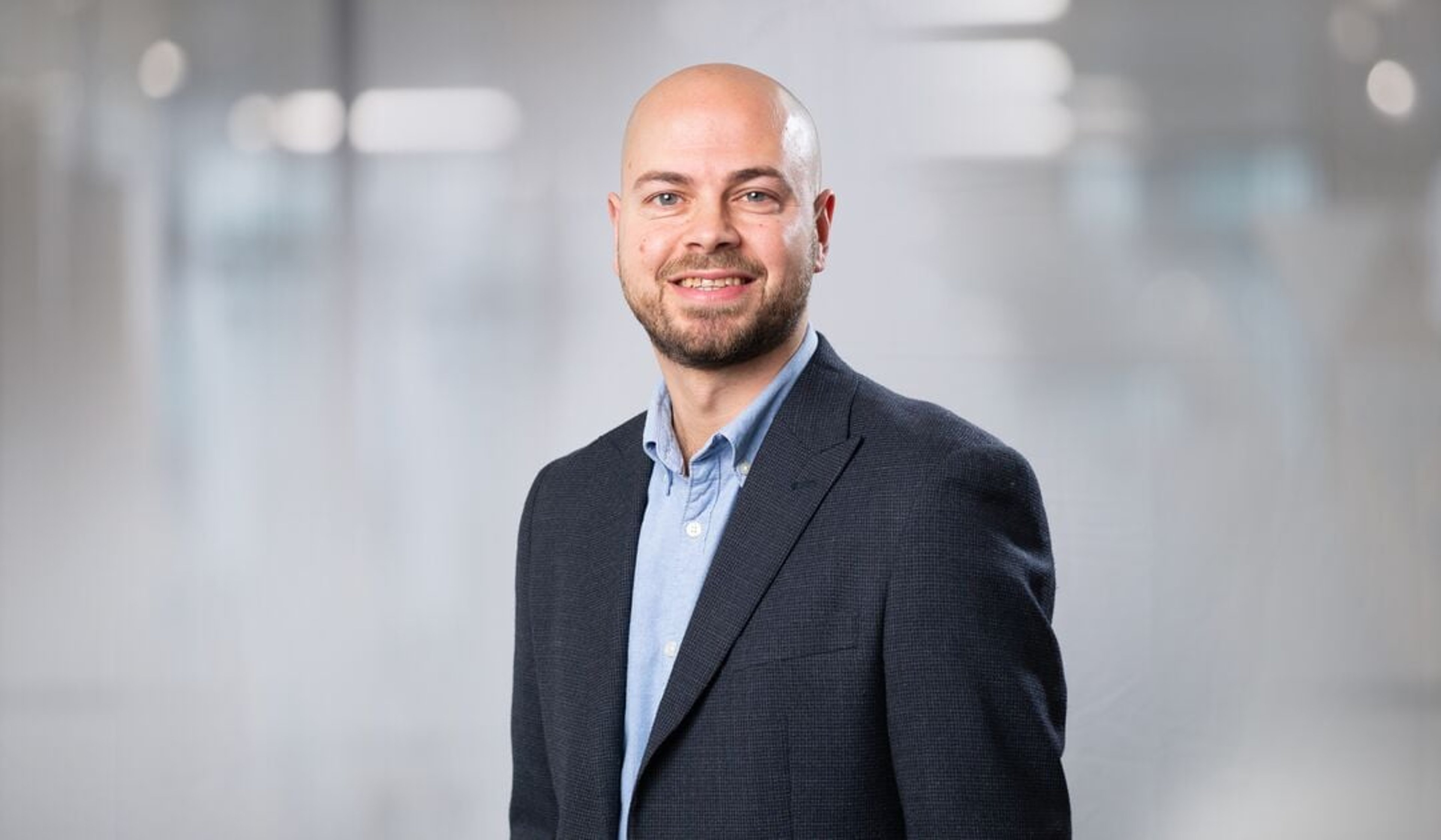 A headshot of Luke Morgan