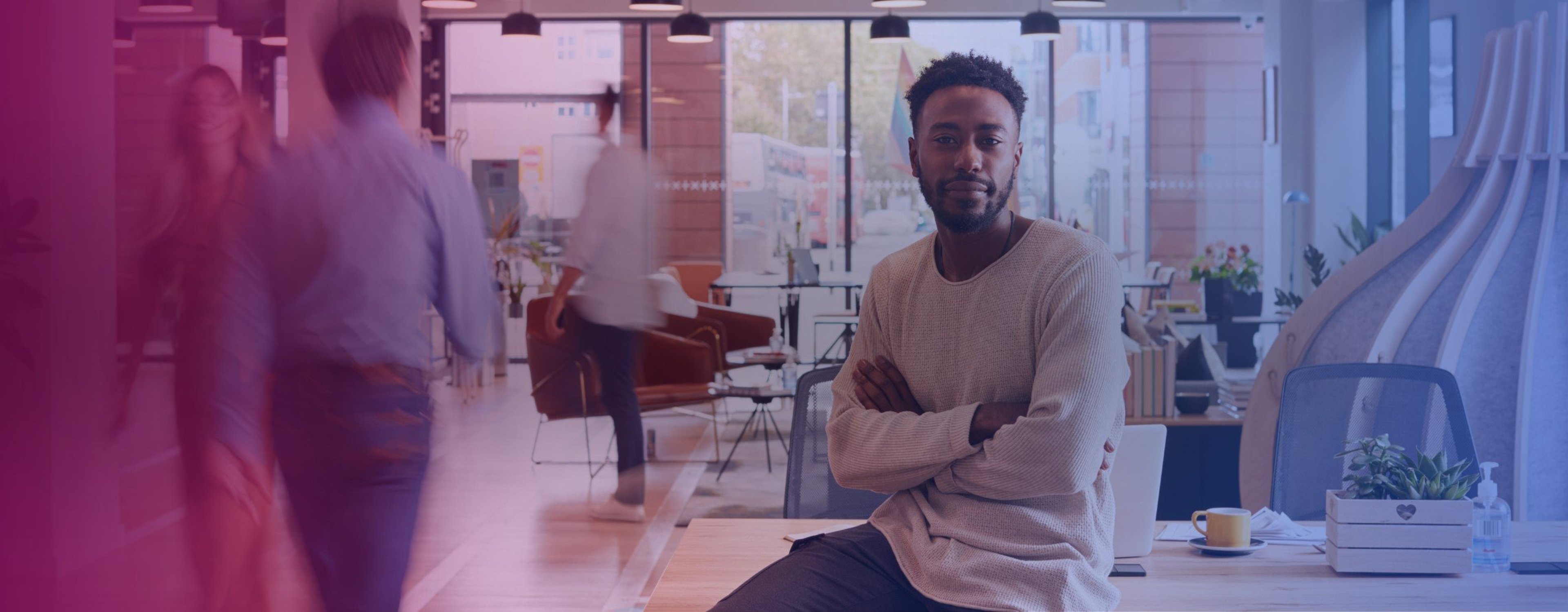 Office stock image with an employee smiling at the camera