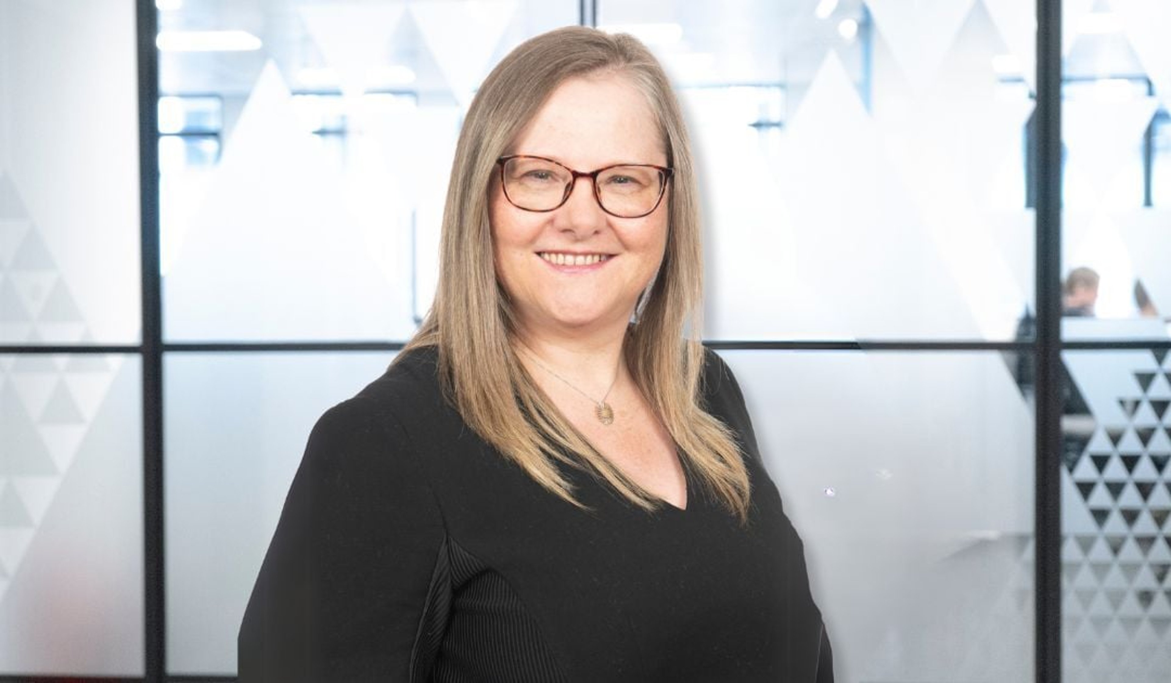 A headshot of Alison Whalley
