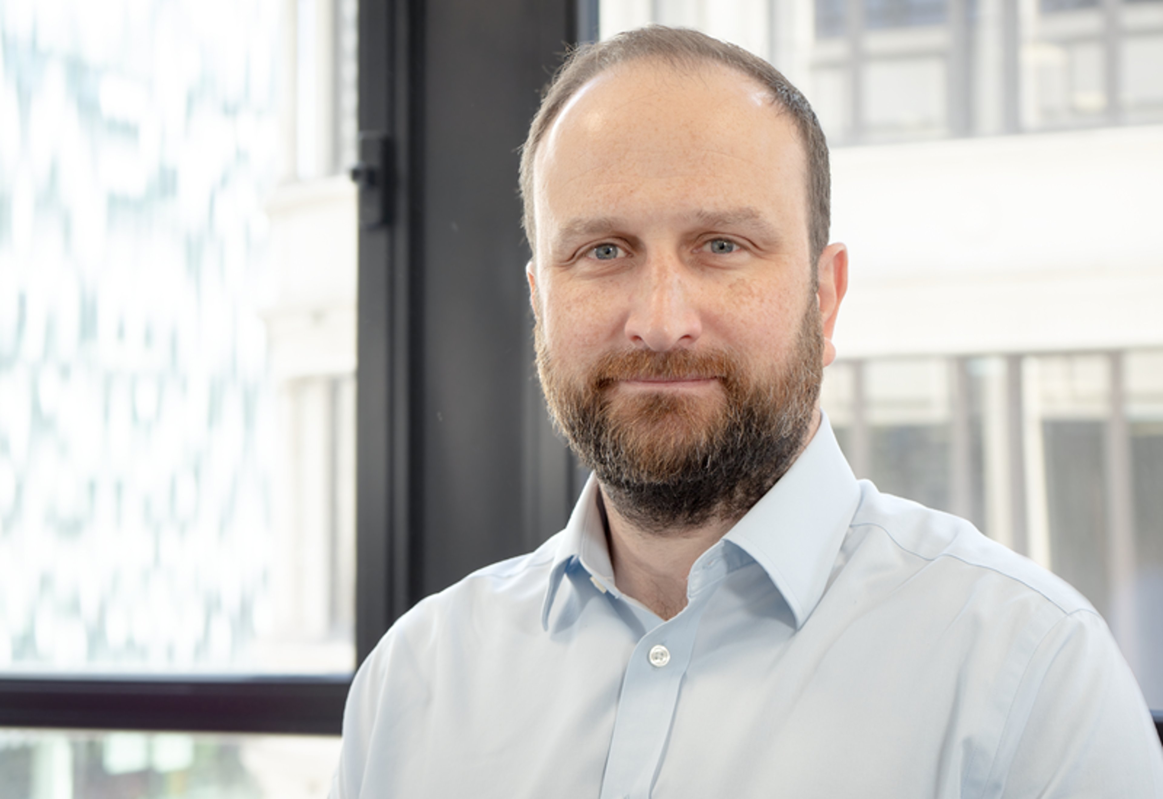 A headshot of Nick Parrett