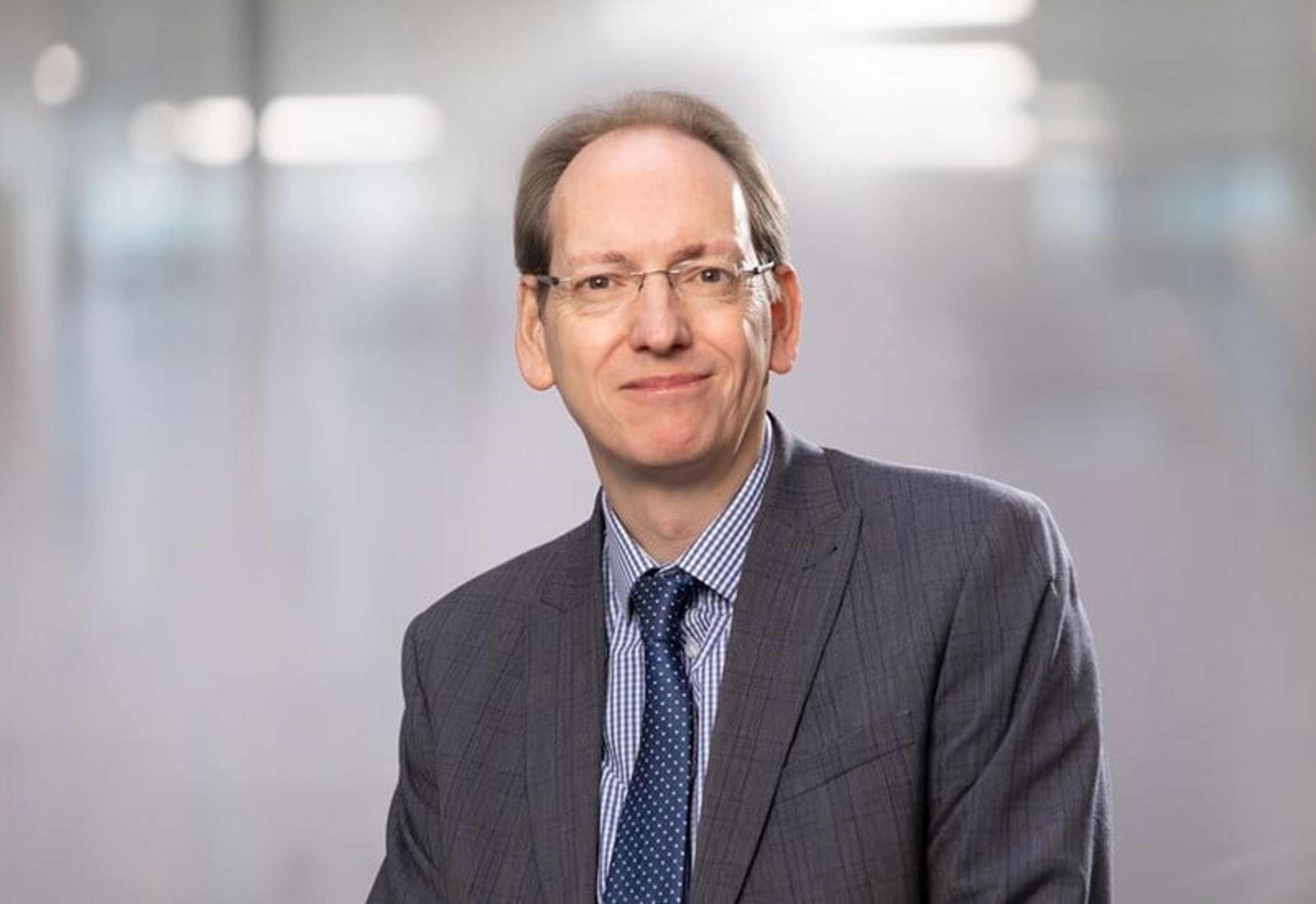 A headshot of James Reilly